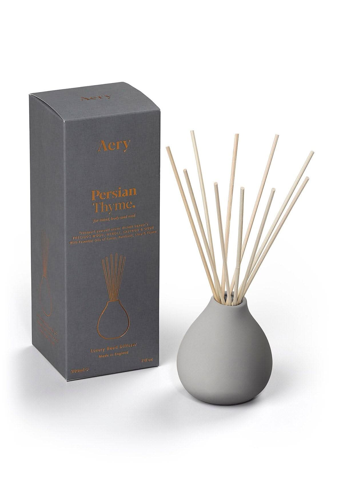 Grey Persian Thyme diffuser with product packaging by Aery